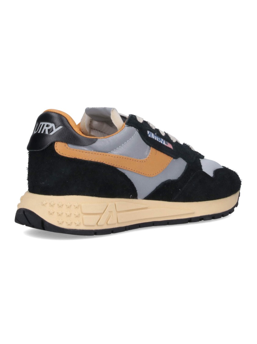 Autry Low Sneaker With Contrast Stitching And Mesh Panels In Black