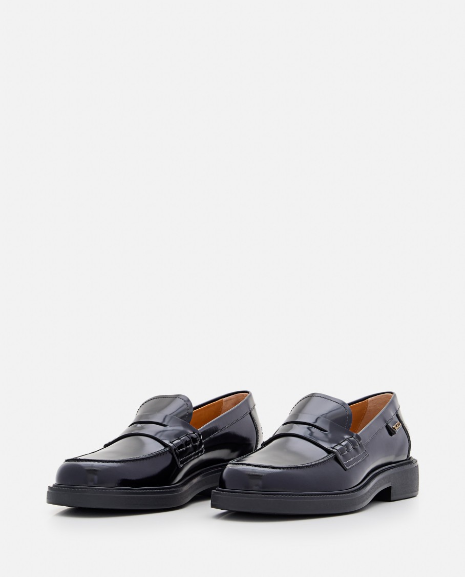 Tod's Mustard Gomma 20l Moccasins With Grommet-accented Heel In Black
