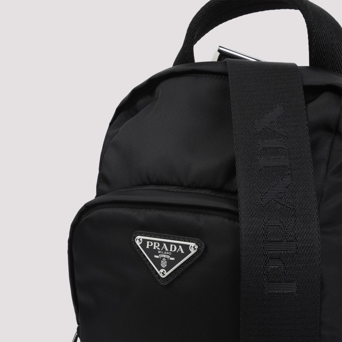 Prada Logo Re-nylon And Saffiano Leather Backpack In Black