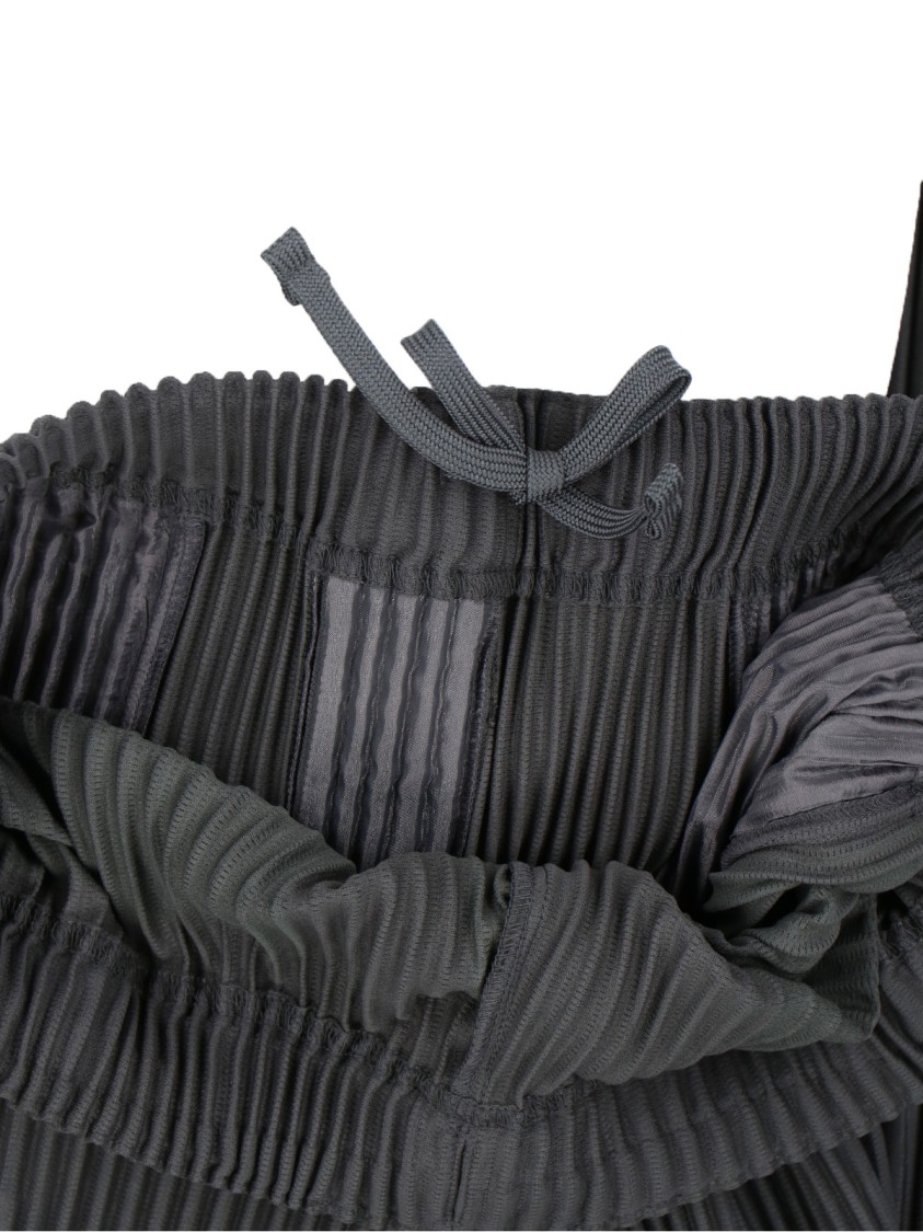 ISSEY MIYAKE HOMME PLISSÉ ISSEY MIYAKE HIGH-WAISTED GREY PLEATED TROUSERS WITH DRAWSTRING CLOSURE
