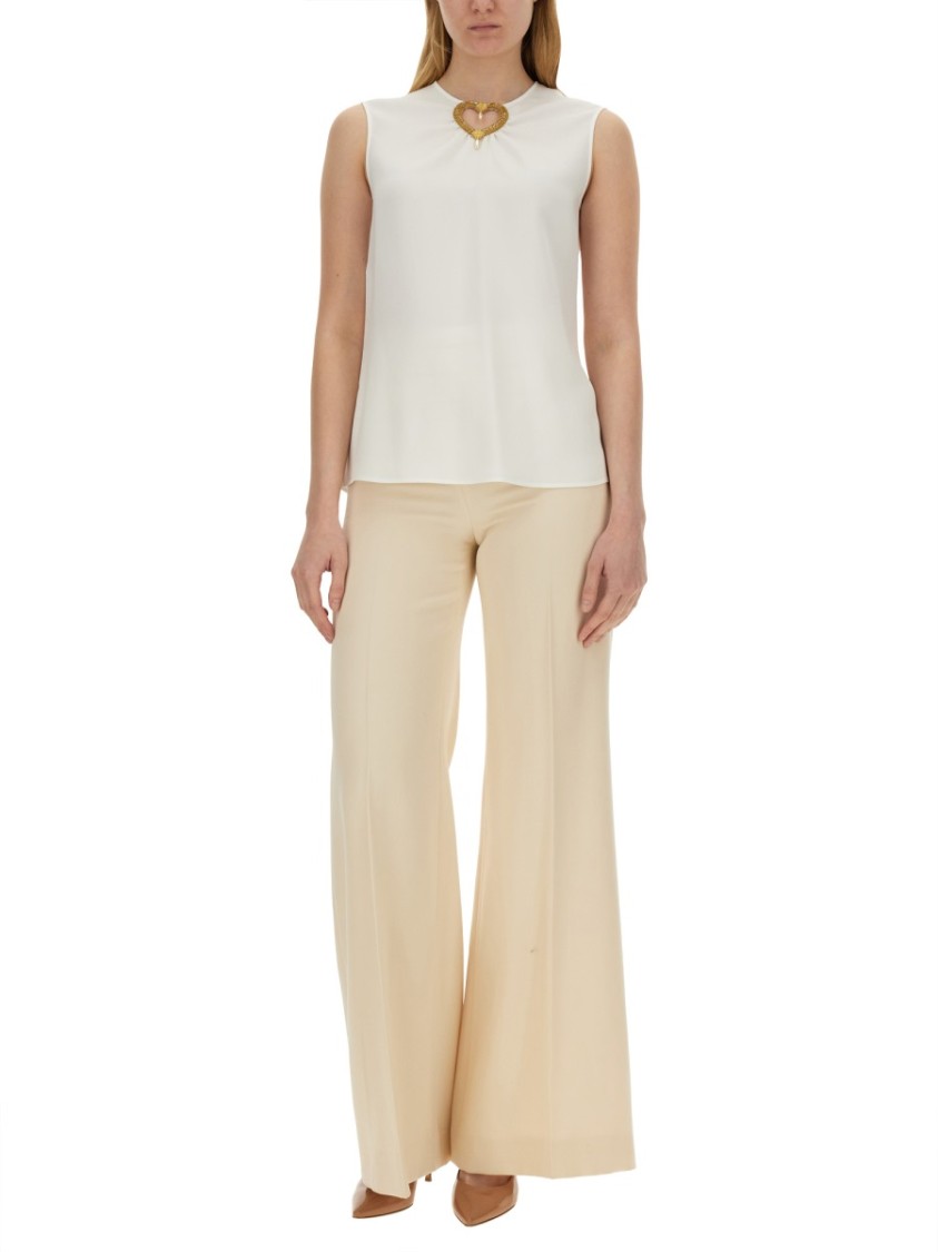 Moschino Blouse With Heart Applique And Subtle Keyhole Detail In White