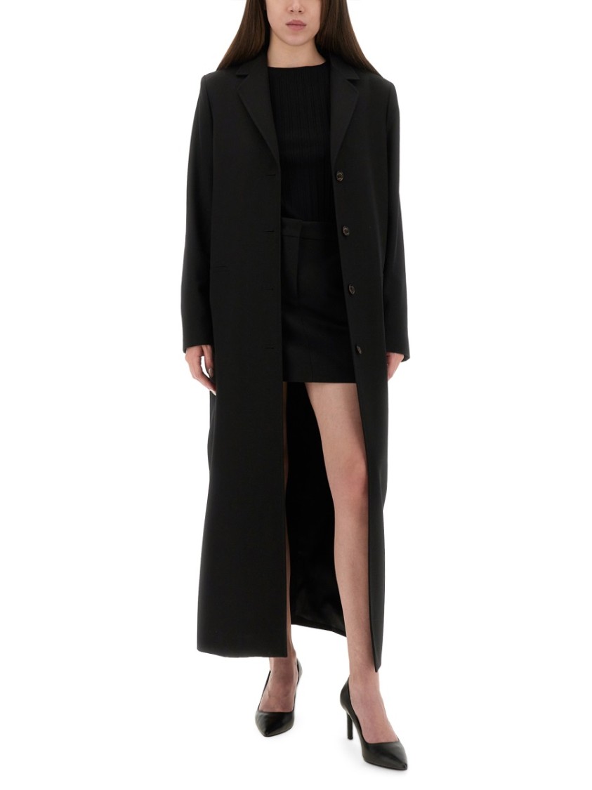Moschino Fitted Mini Skirt With Subtle Side Pockets In Black