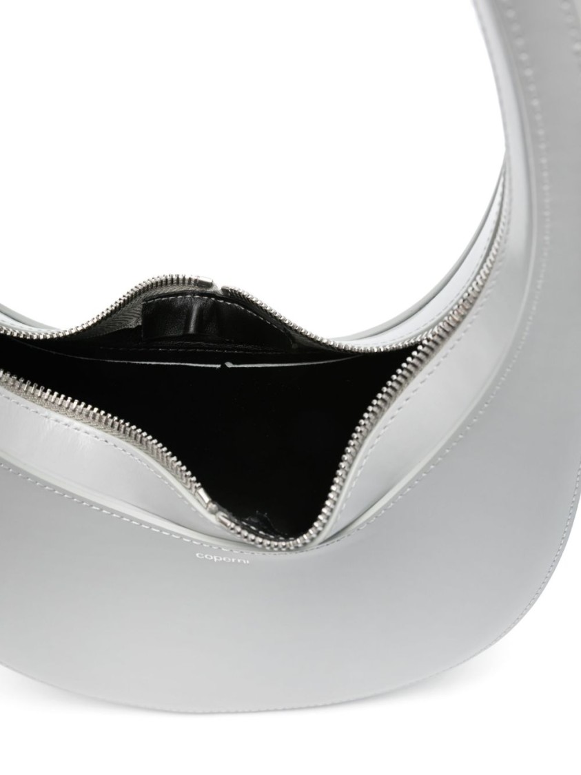 Shop Coperni Oval-shape Shoulder Bag With Smooth Structured Design