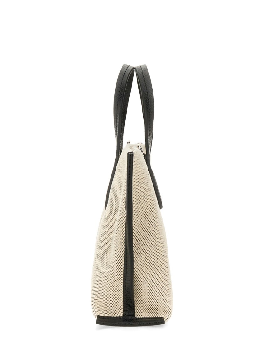 Shop Longchamp Textured Cotton Handbag With Leather Handles