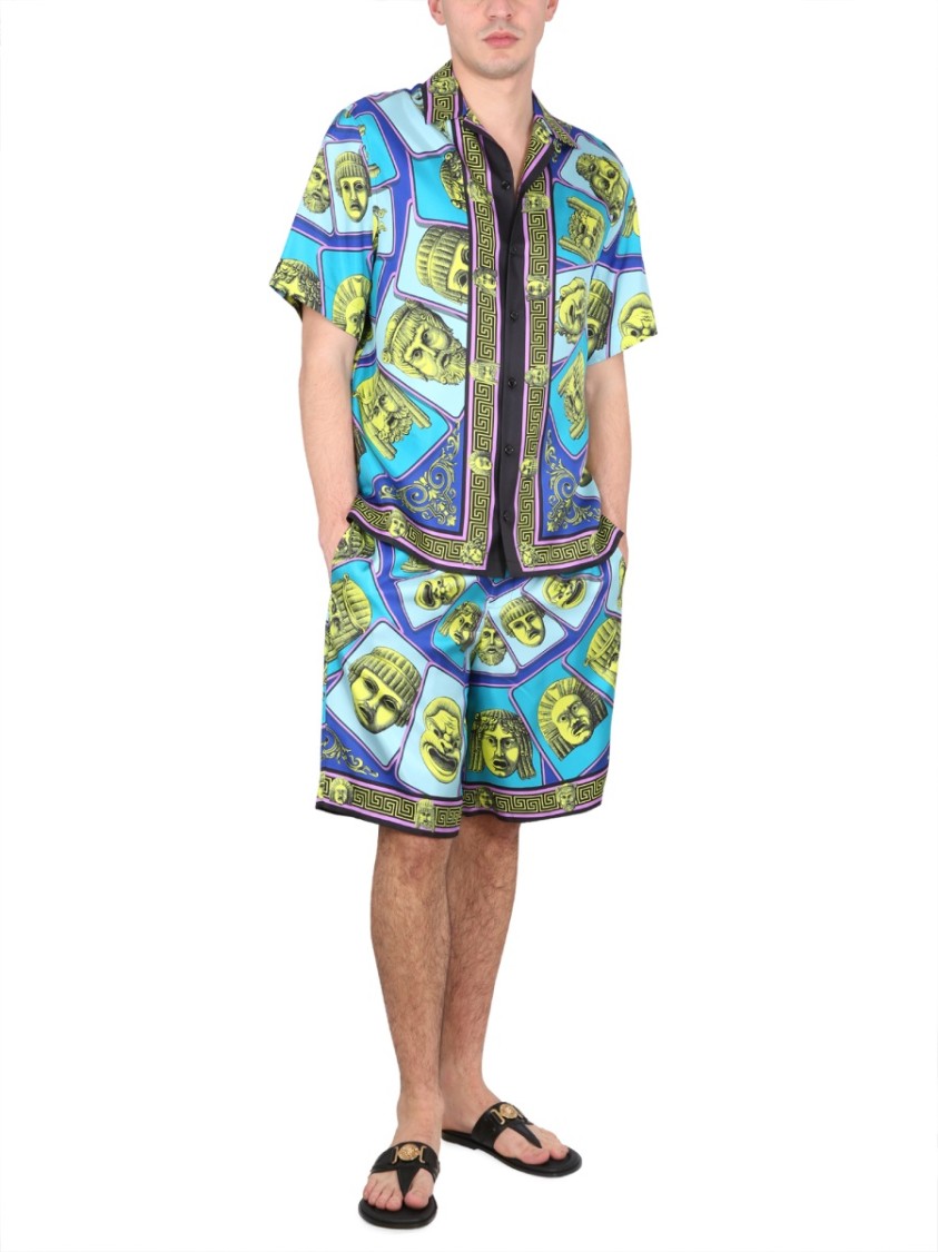 Versace Le Maschere Print Silk Shorts In Green