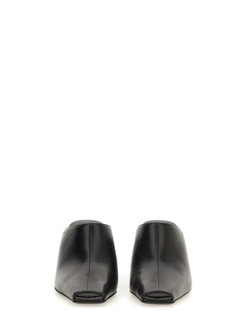 COURRÈGES COURRÈGES POINTED TOE MULES IN SMOOTH LEATHER