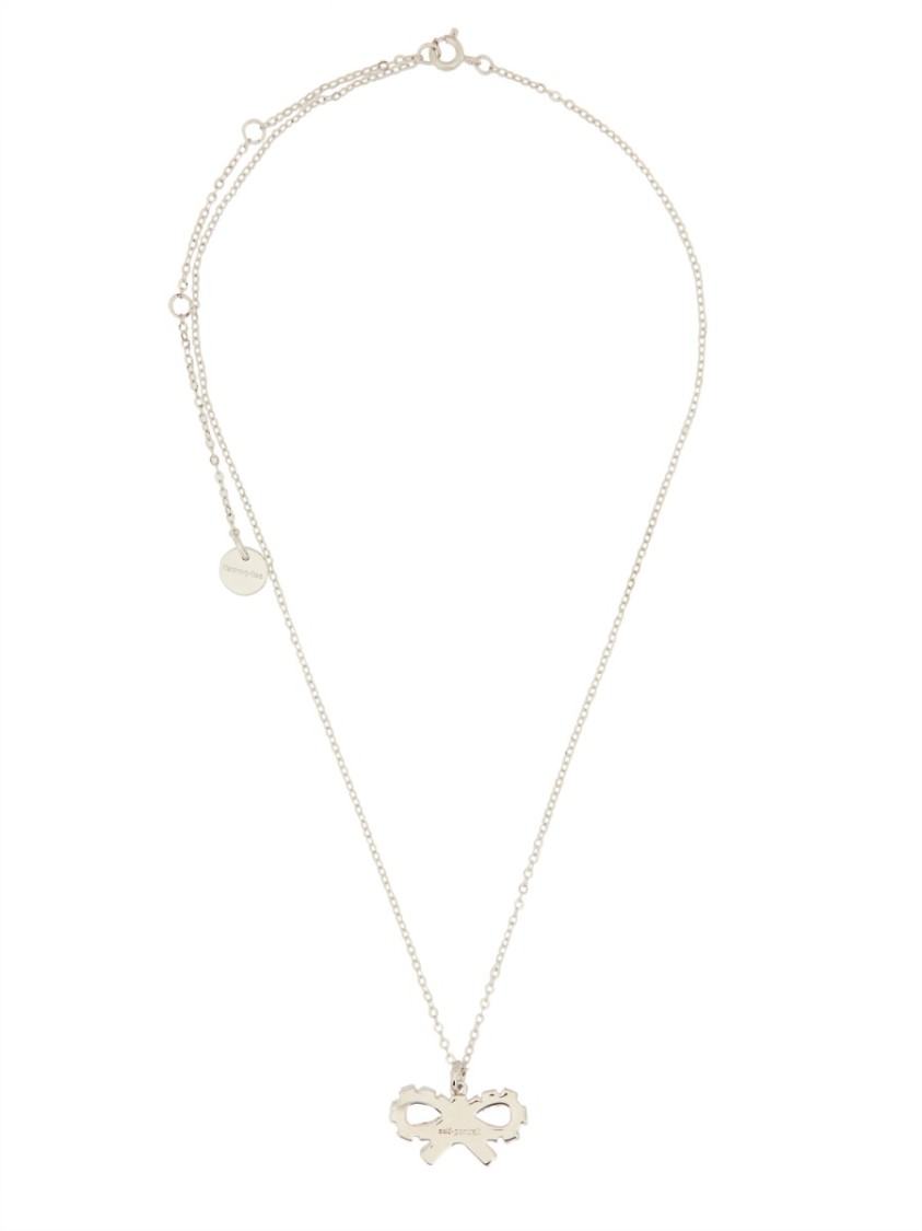 Self-portrait Charming Bow Pendant Necklace In Polished Brass In Silver