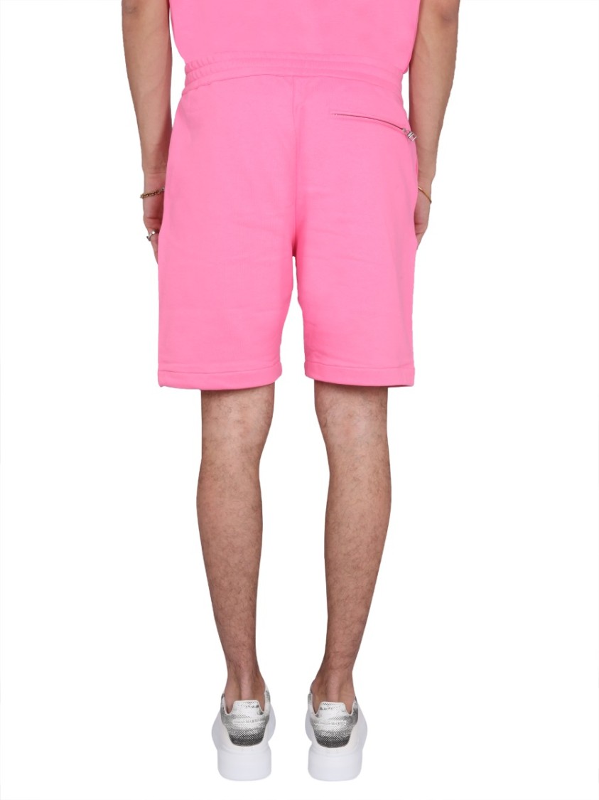 Alexander Mcqueen Bermuda Shorts With Graffiti Logo Print In Pink