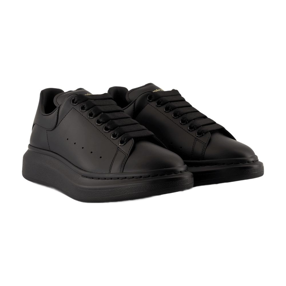 Alexander Mcqueen Black Sneakers With Logo Lettering On The Rear And Oversize Rubber Sole In Leather