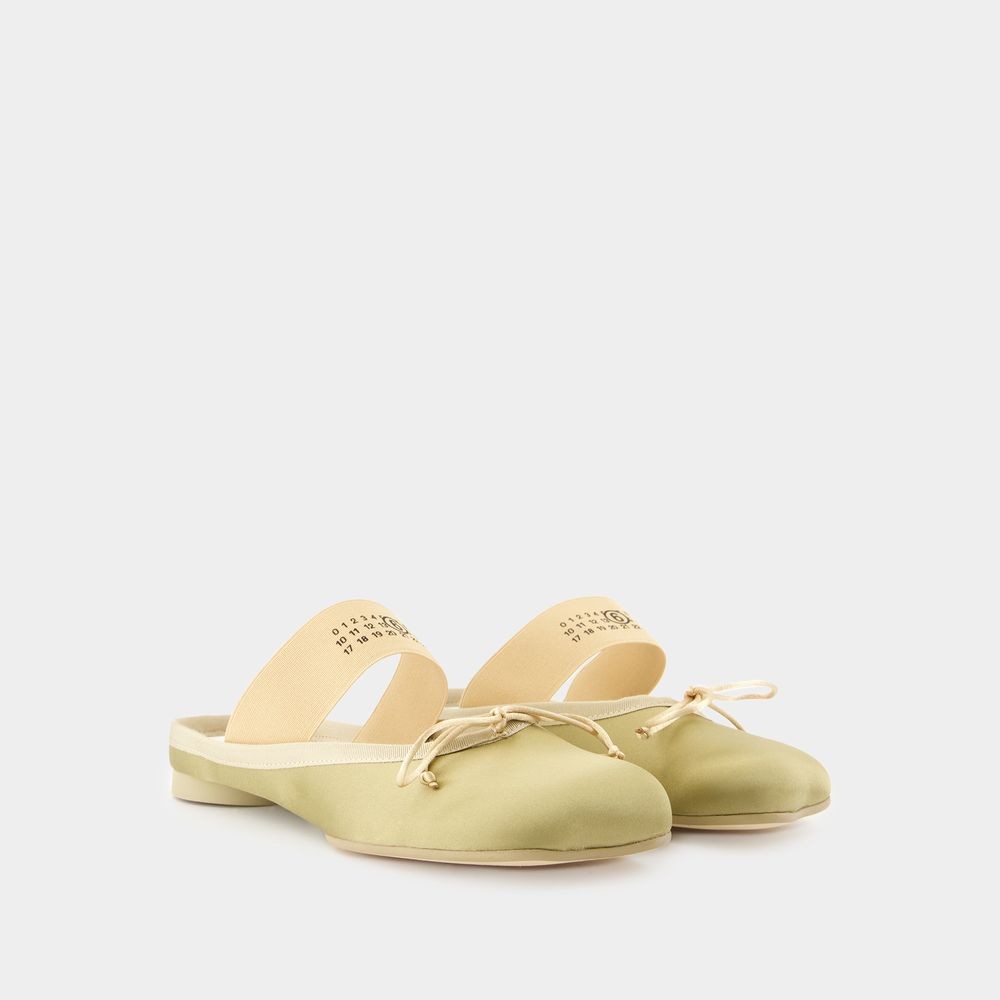 Shop Mm6 Maison Margiela Mm6 By Maison Margiela Mules With Decorative Bow Detail In Yellow