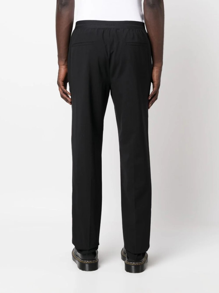 Msgm Versatile Trousers For The Modern Man In Black