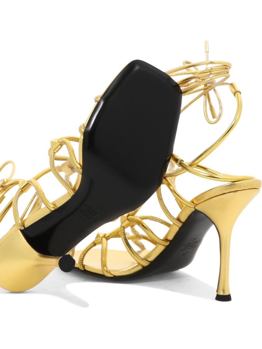 Valentino Rockstud Net 100 Metallic Leather Sandals In Gold