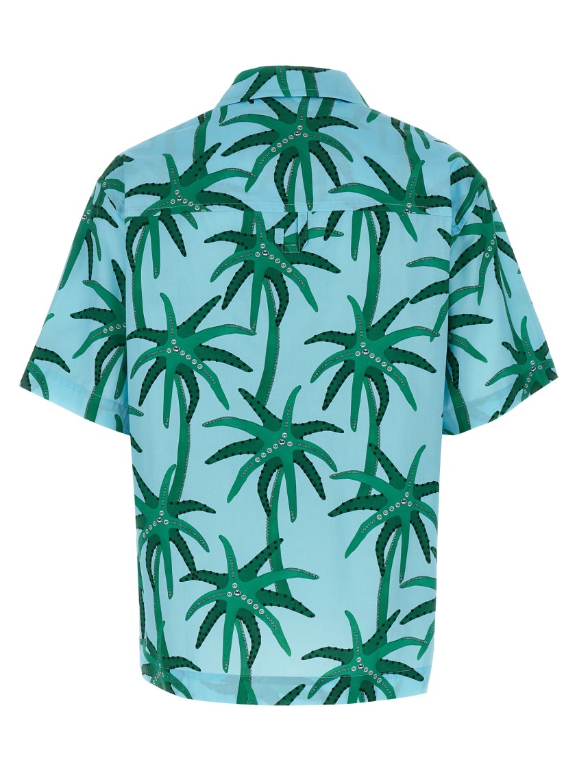 Jacquemus 'la Chemise Jean' Light Blue Shirt With Notched Collar And All-over Palm Tree Print In Blue