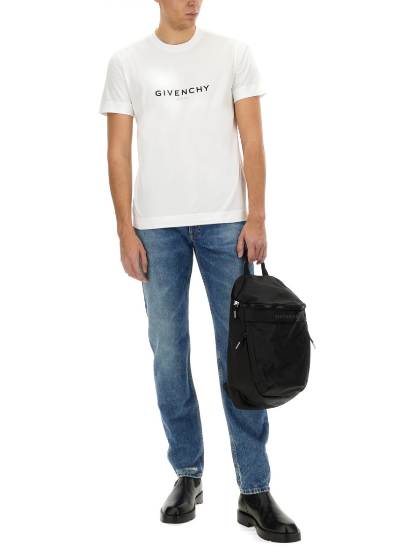Givenchy Washed Denim Tapered Leg Jeans With Contrast Stitching