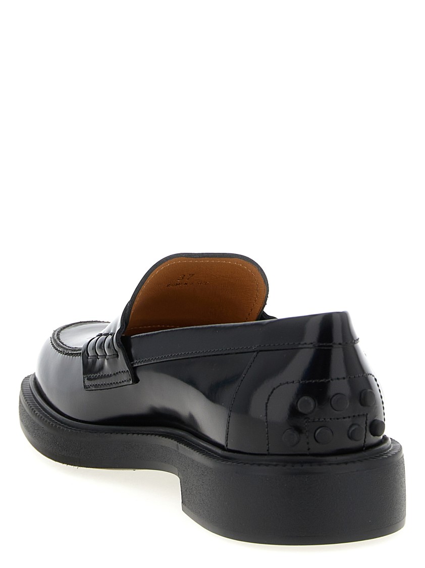 Tod's Mustard Gomma 20l Moccasins With Grommet-accented Heel In Black
