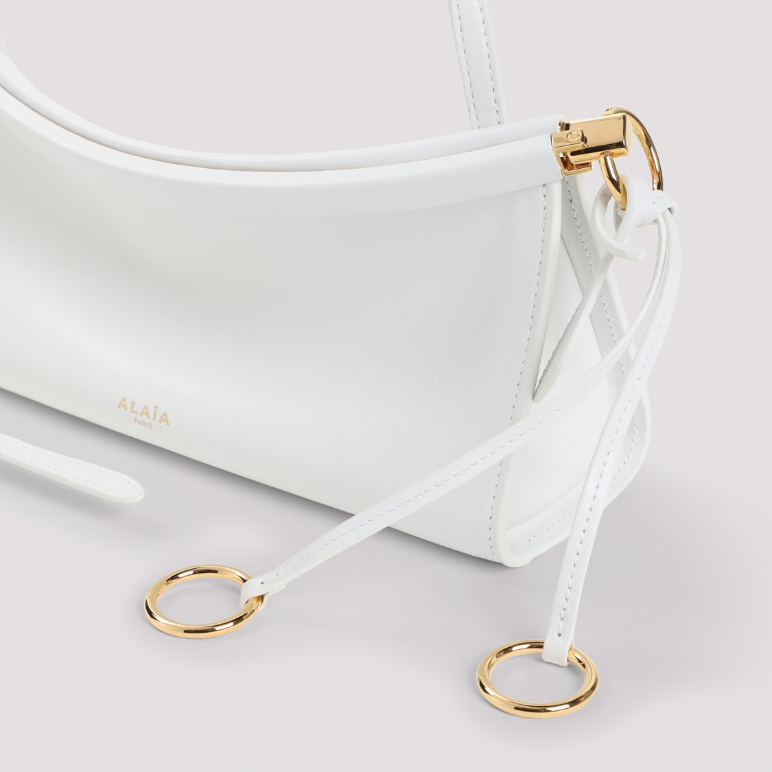 Shop Alaïa East West S White Calf Leather Shoulder Bag
