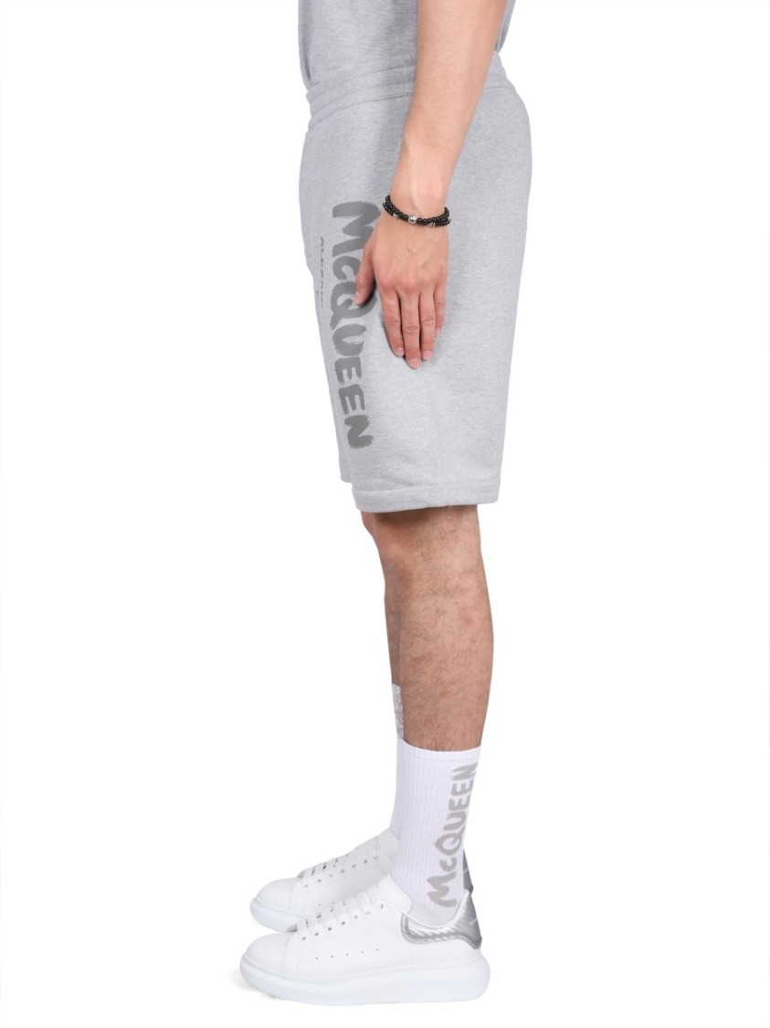 Alexander Mcqueen Men Bermuda Shorts With Graffiti Logo Print In Grey