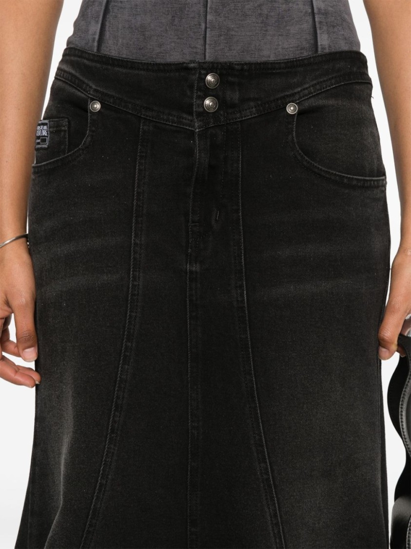 VERSACE JEANS COUTURE VERSACE JEANS COUTURE FLARED BLACK DENIM SKIRT WITH RAW HEM AND FIVE-POCKET DESIGN
