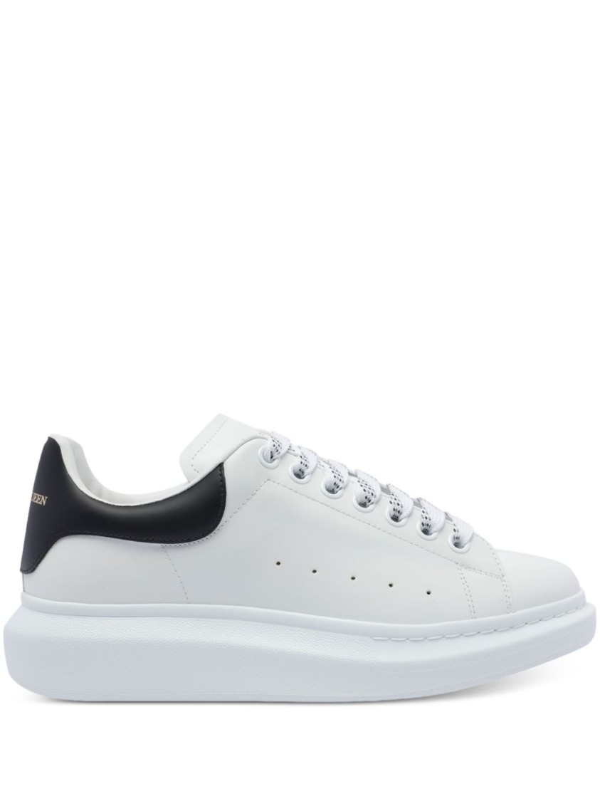 Alexander Mcqueen Minimalist White Leather Sneakers With Contrasting Heel Tab In White