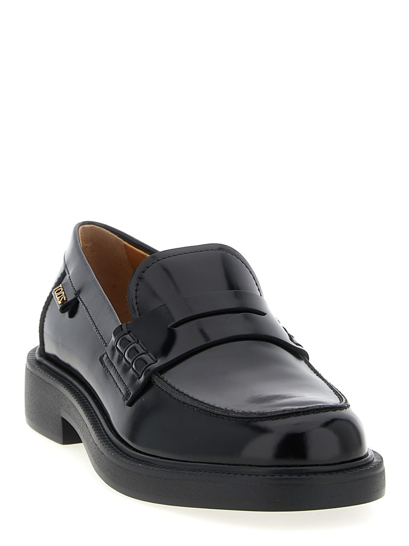 Tod's Mustard Gomma 20l Moccasins With Grommet-accented Heel In Black