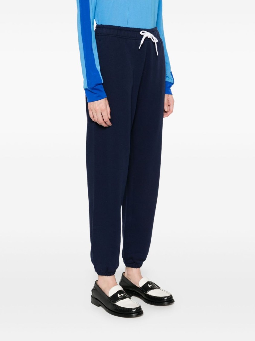 Shop Polo Ralph Lauren Relaxed-fit Blue Trousers With Tapered Cuffs