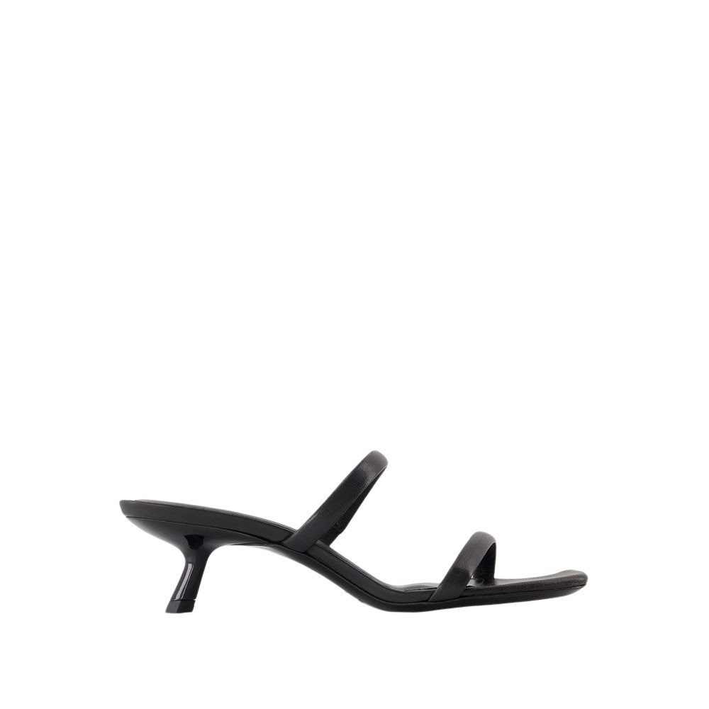 Shop Anine Bing Sleek Black Calfskin Mules With Curved Heel