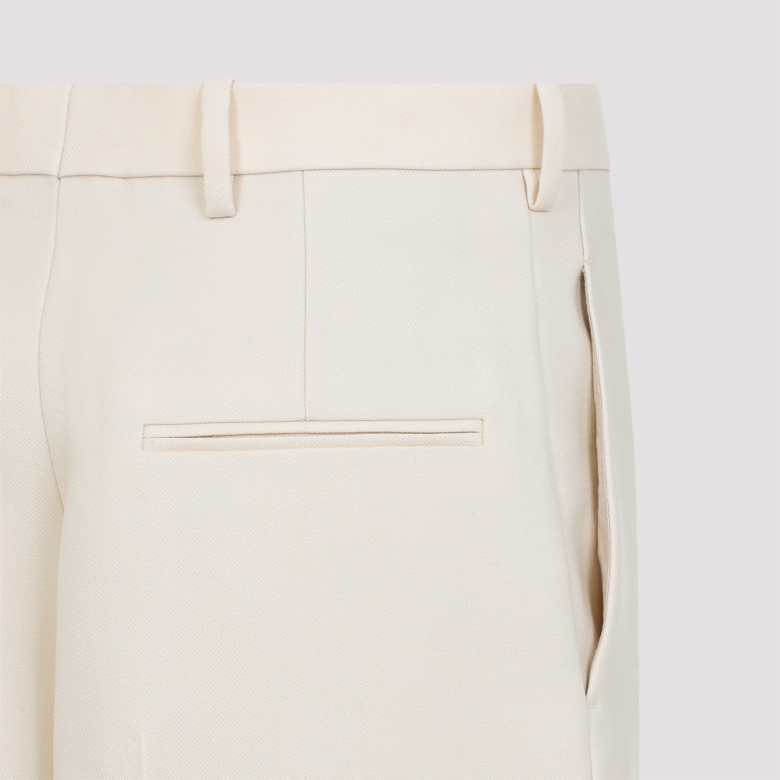 CARVEN CARVEN HIGH-WAISTED TAILORED WOOL TROUSERS WITH SUBTLE PLEATS