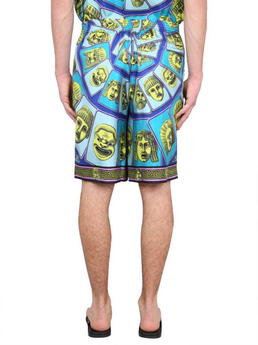 Versace Le Maschere Print Silk Shorts In Green