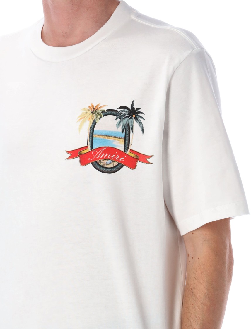 Amiri Ivory Paradise Tee With Vibrant Graphic Print | THE LIST