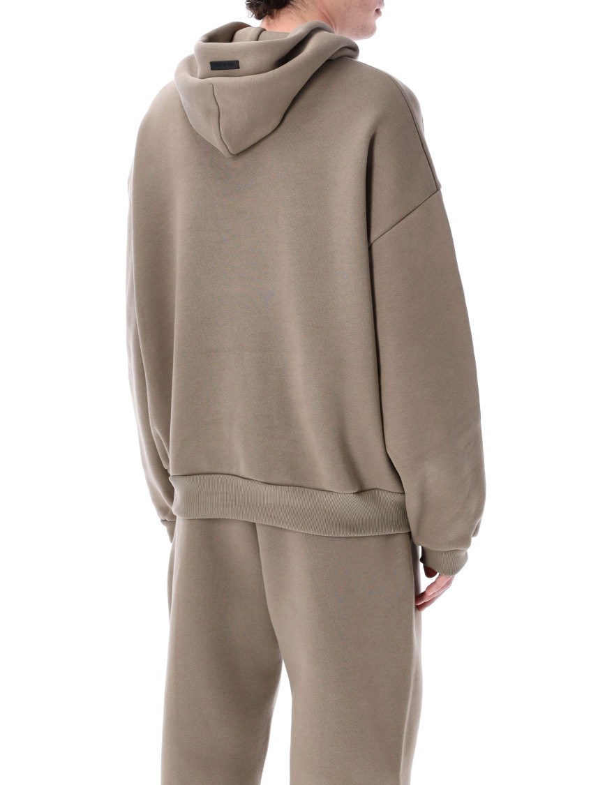 Shop Fear Of God Relaxed Fit Dusty Beige Hoodie With Embossed Logo