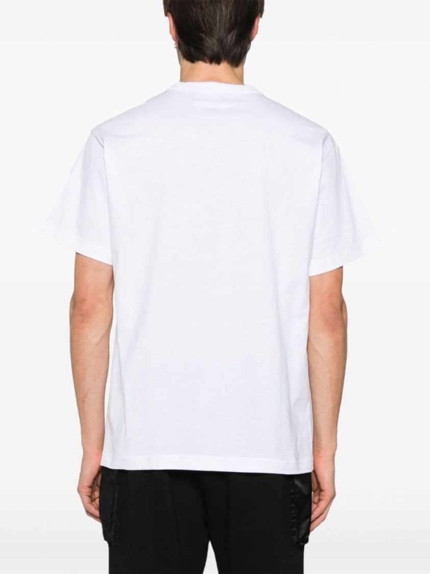 Shop Versace Jeans Couture White T-shirt With Graphic Pocket Detail