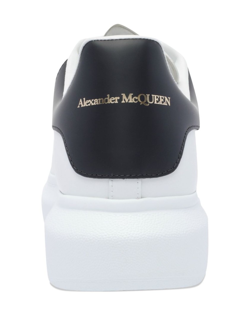 Alexander Mcqueen Minimalist White Leather Sneakers With Contrasting Heel Tab In White