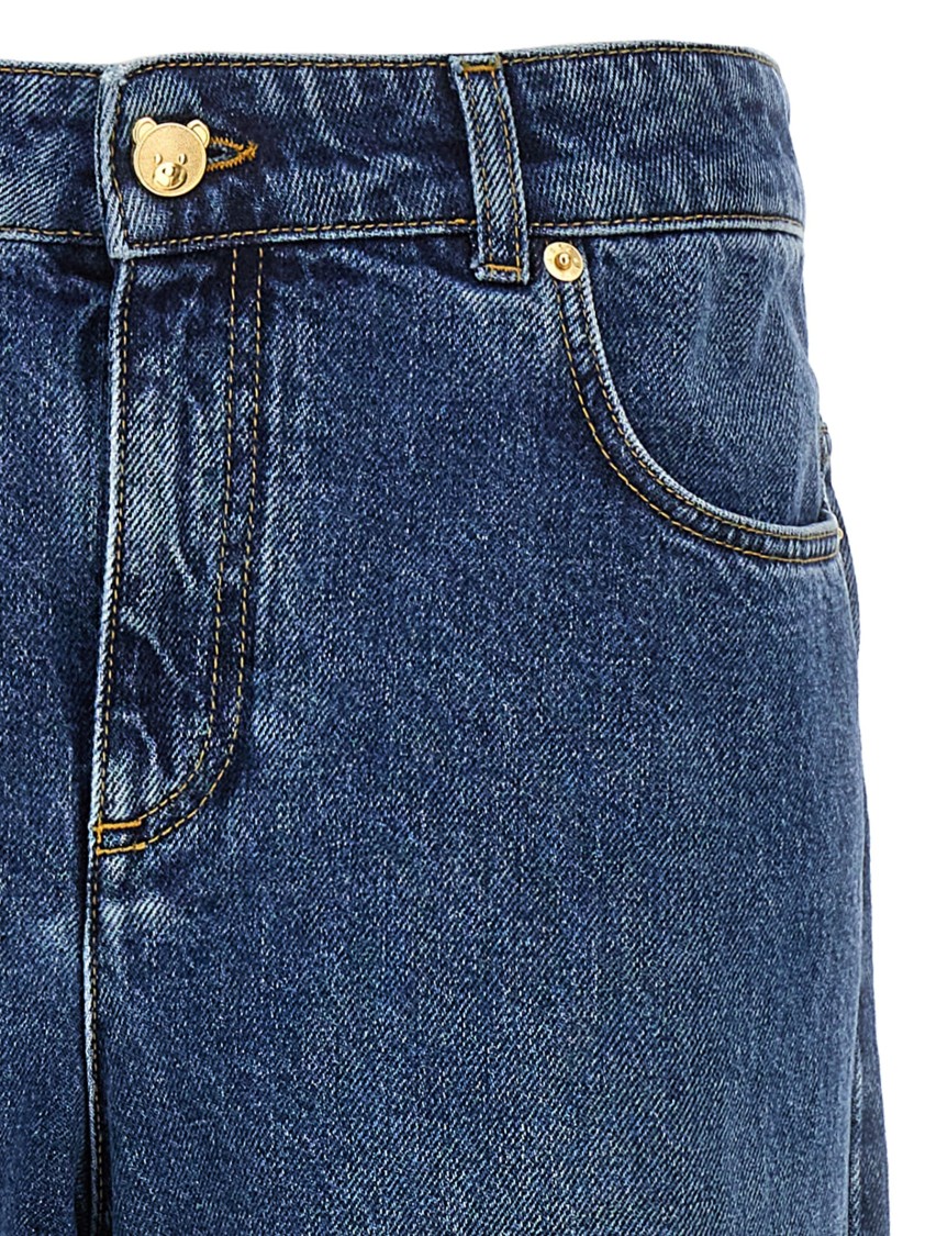 Moschino Wide-leg Denim Jeans With Teddy Button Closure In Blue