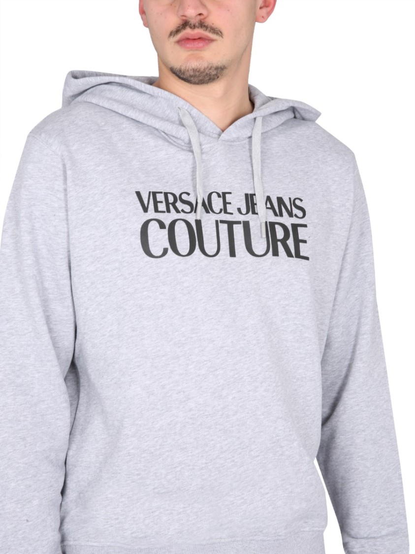 Shop Versace Jeans Couture Cross-neck Grey Sweatshirt With Bold Logo Design