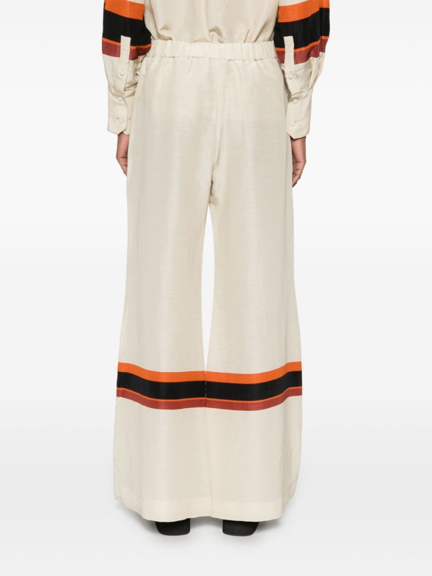 Shop Raquel Diniz Wide-leg Ivory Pants With Bold Stripes