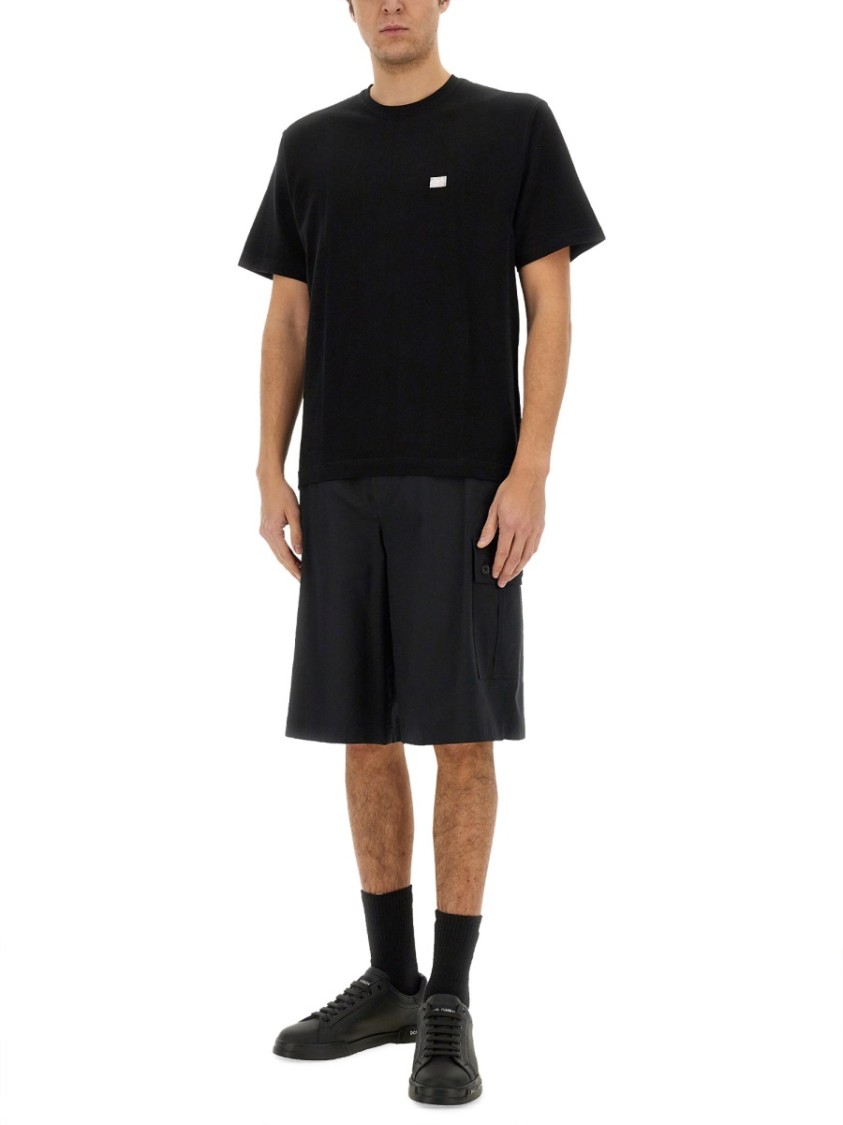 Dolce & Gabbana Cotton T-shirt With Metal Plaque Featuring Front Logo In Black