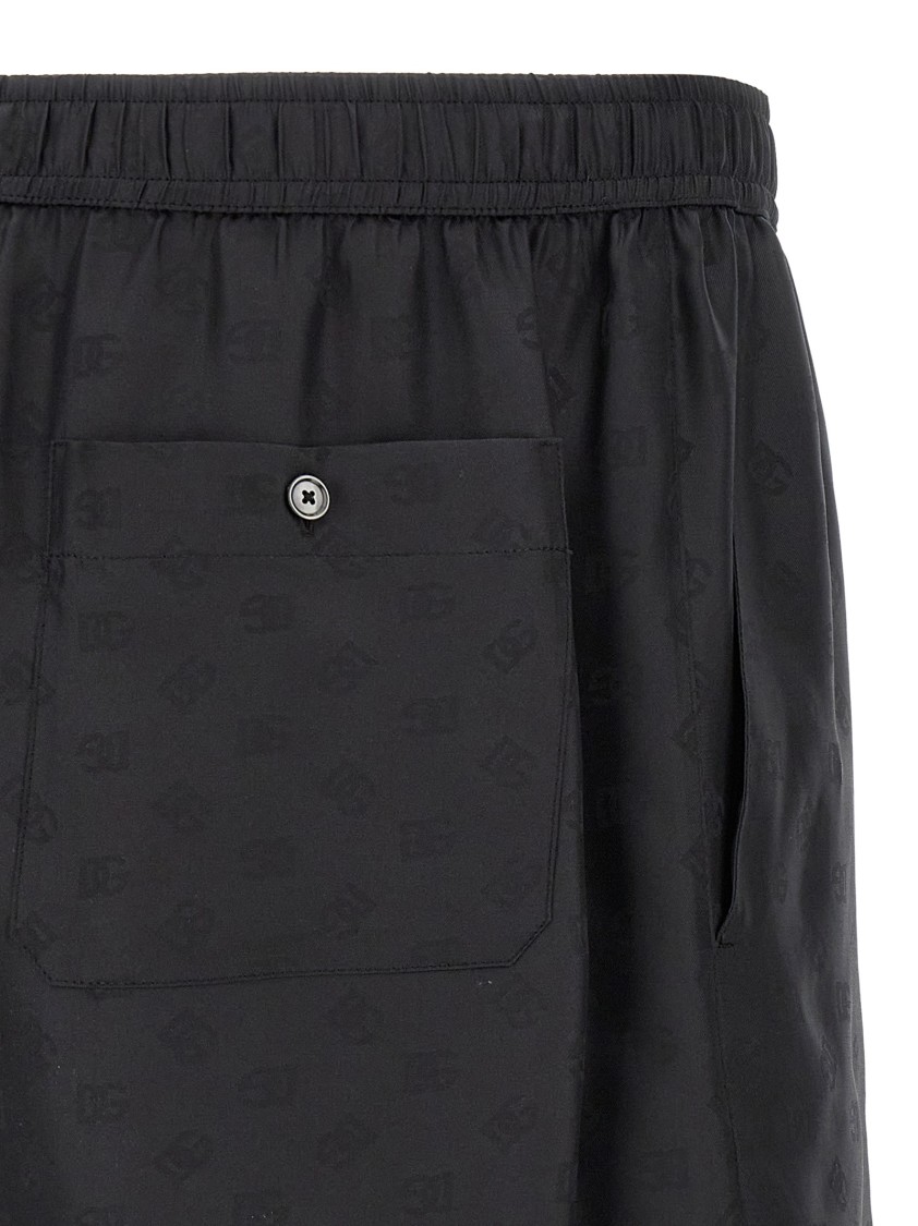 Dolce & Gabbana Black Bermuda Pants With Drawstring Elastic Waist And Maxi Print In Silk Man In Black