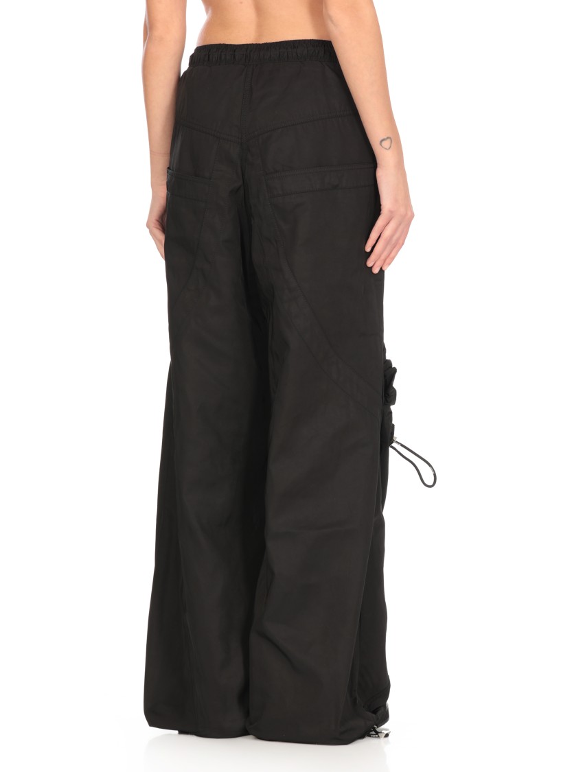 Shop Attico The Flared Cargo Pants In Black