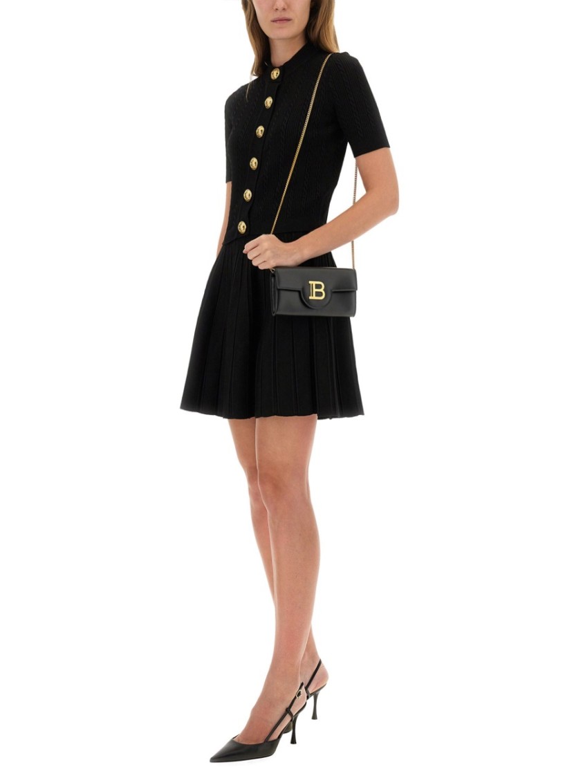 Balmain Textured Ribbed Knitted Cardigan With Button-up Front In Black
