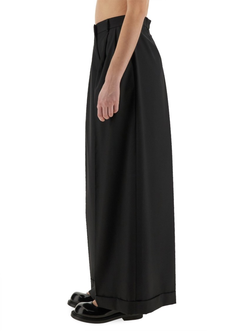 Moschino Couture Asymmetrical Wool Pants In Black