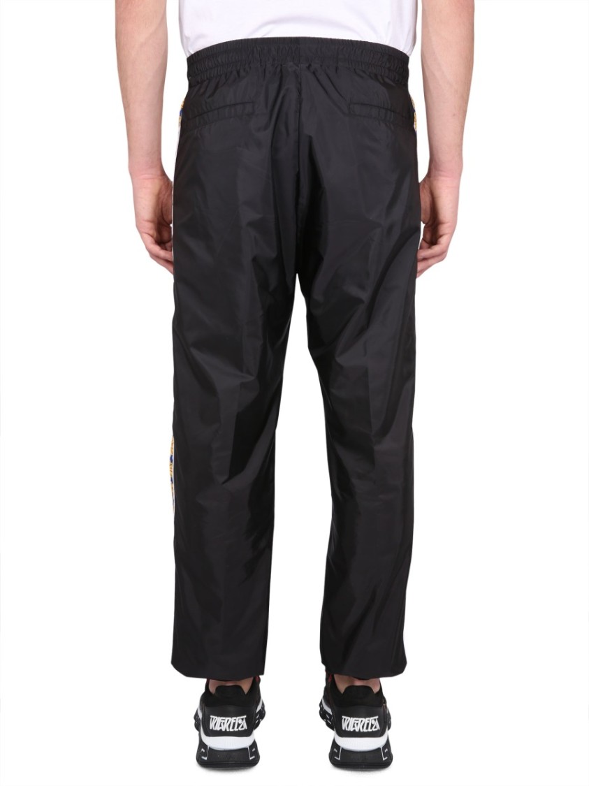 Versace Graphic-stripe Taffeta Track Pants In Black