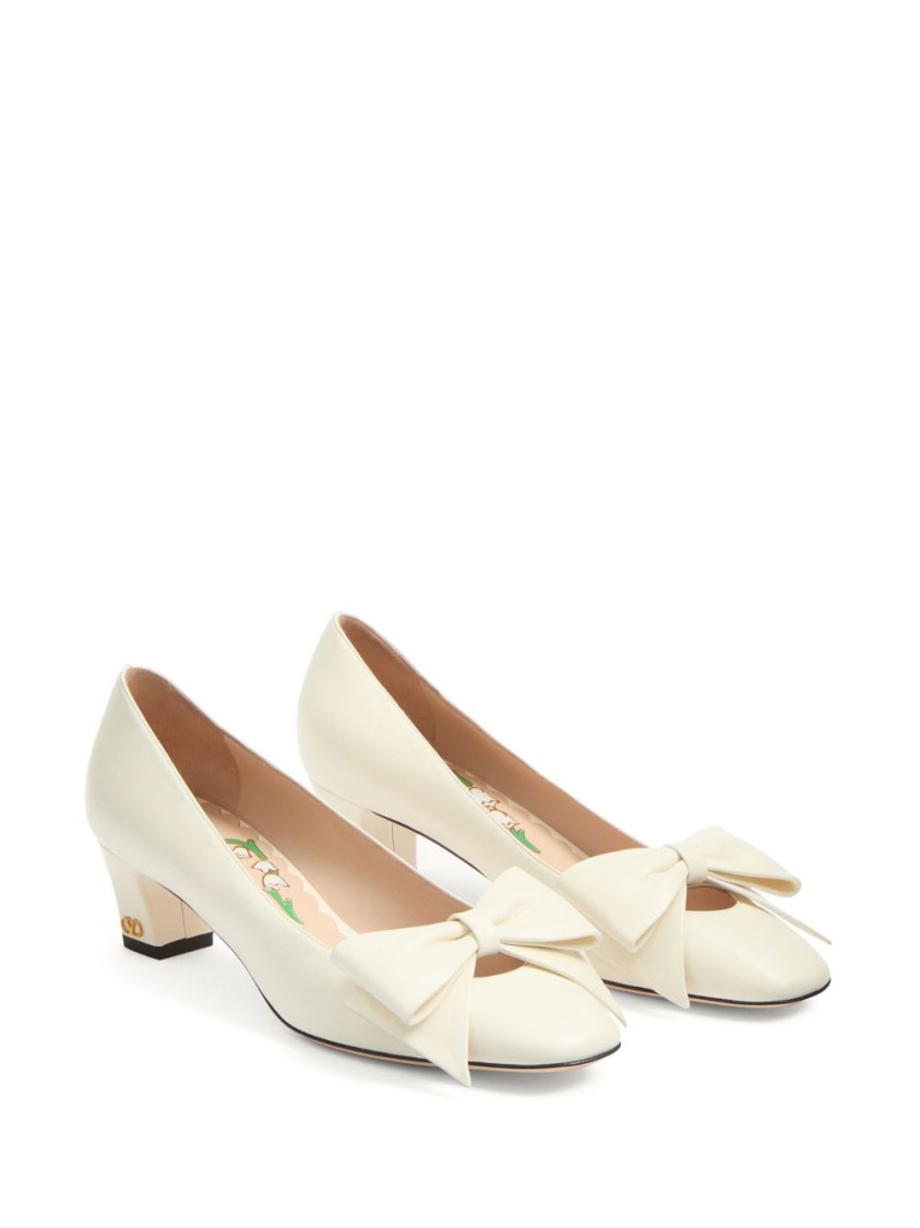 Shop Valentino Garavani Bow Detail White Leather Pumps With Signature V Logo