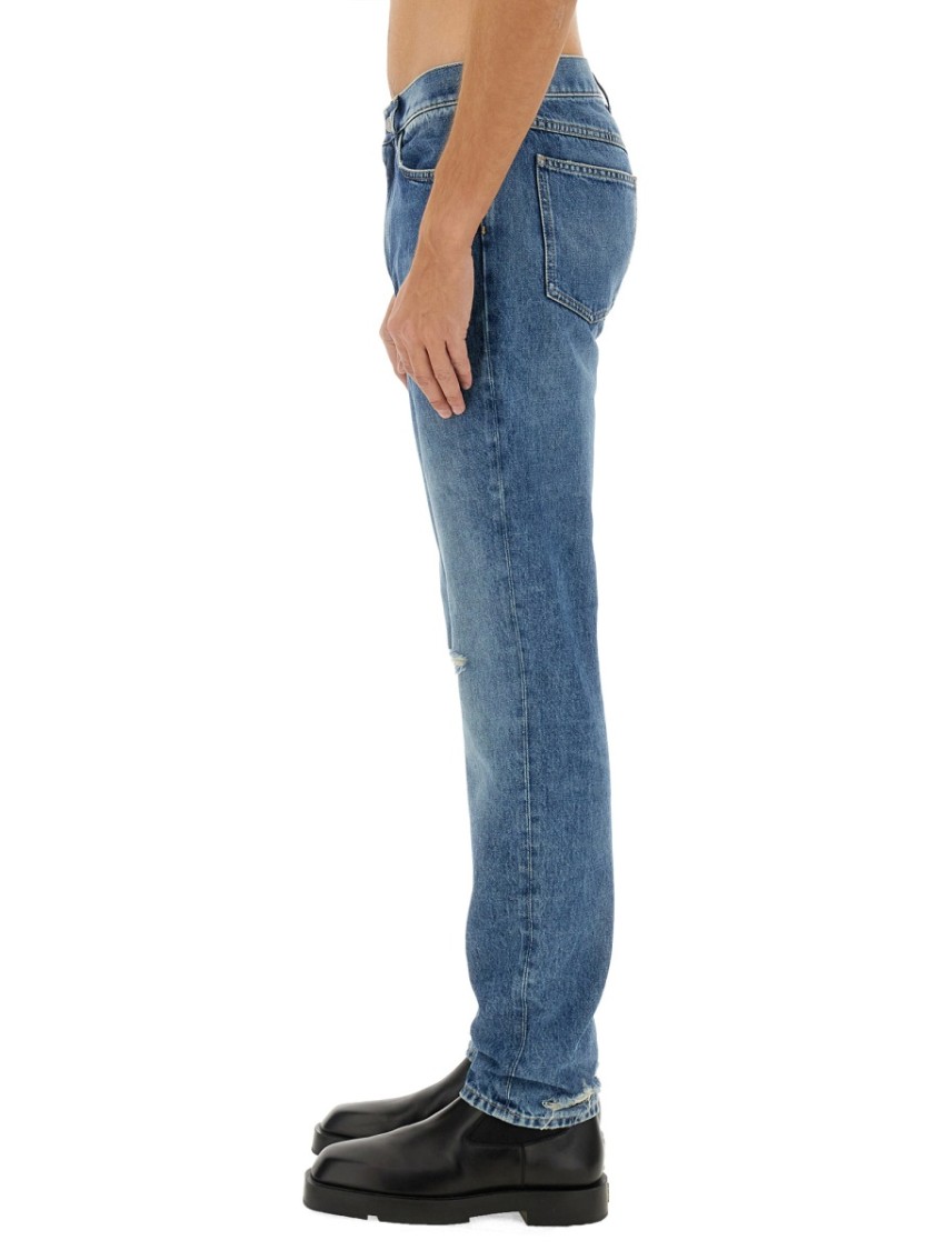 Givenchy Washed Denim Tapered Leg Jeans With Contrast Stitching