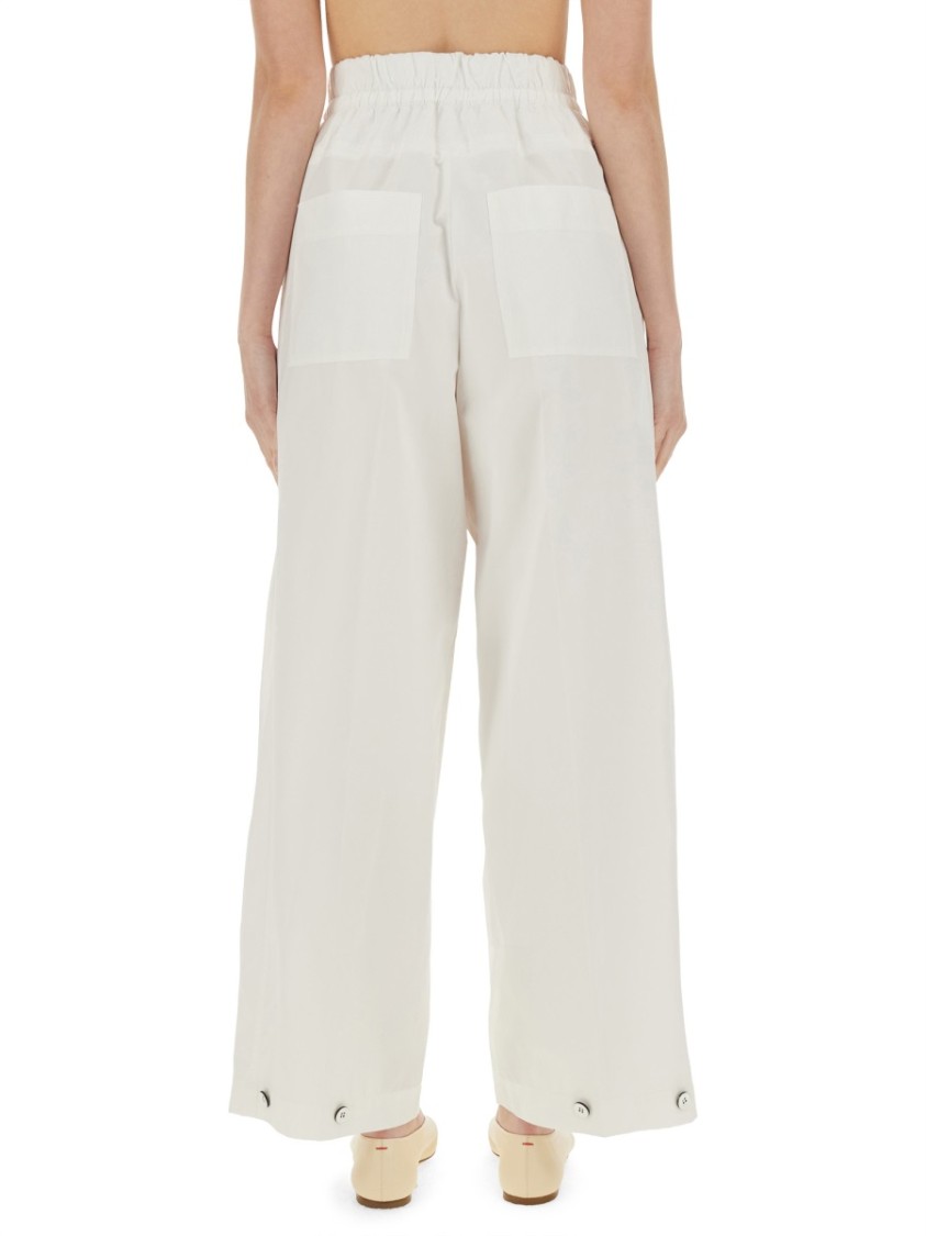 Jil Sander Elasticated Waistband Pleated Trousers In White