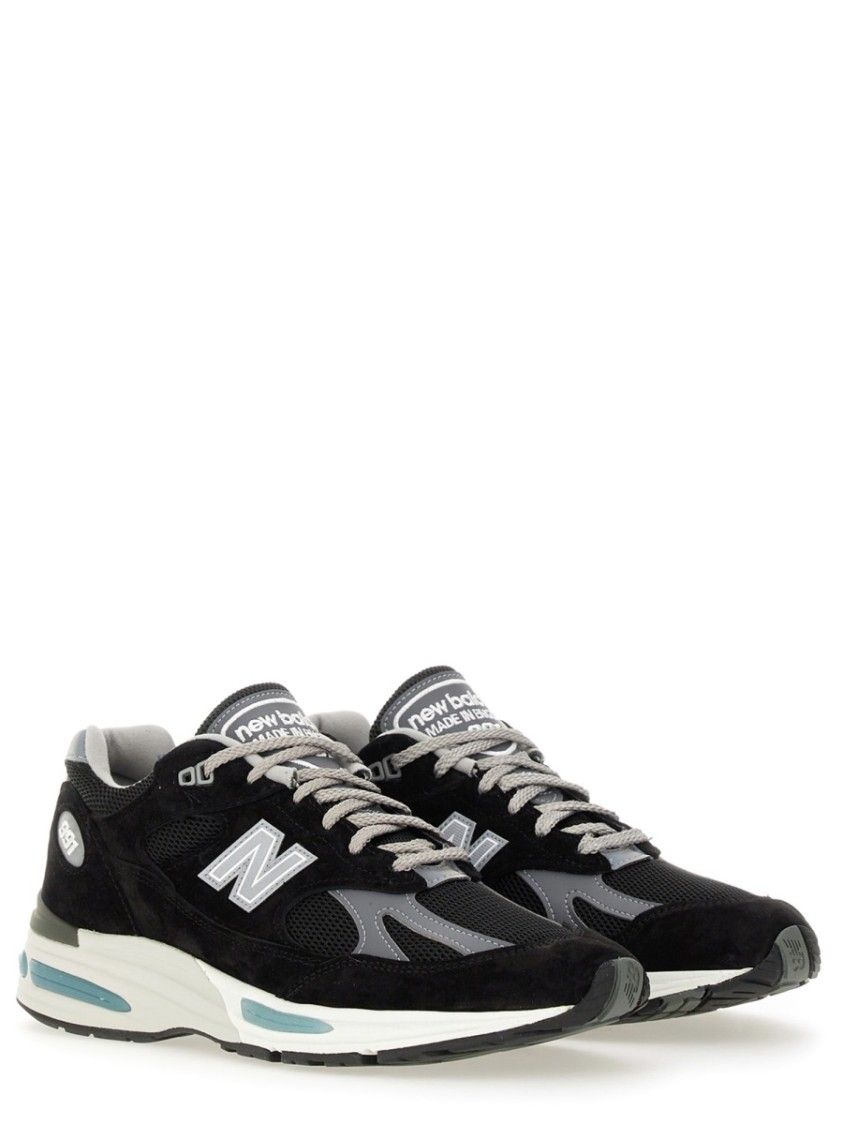 New Balance Mesh And Suede Sneakers With Reflective Accents In Black