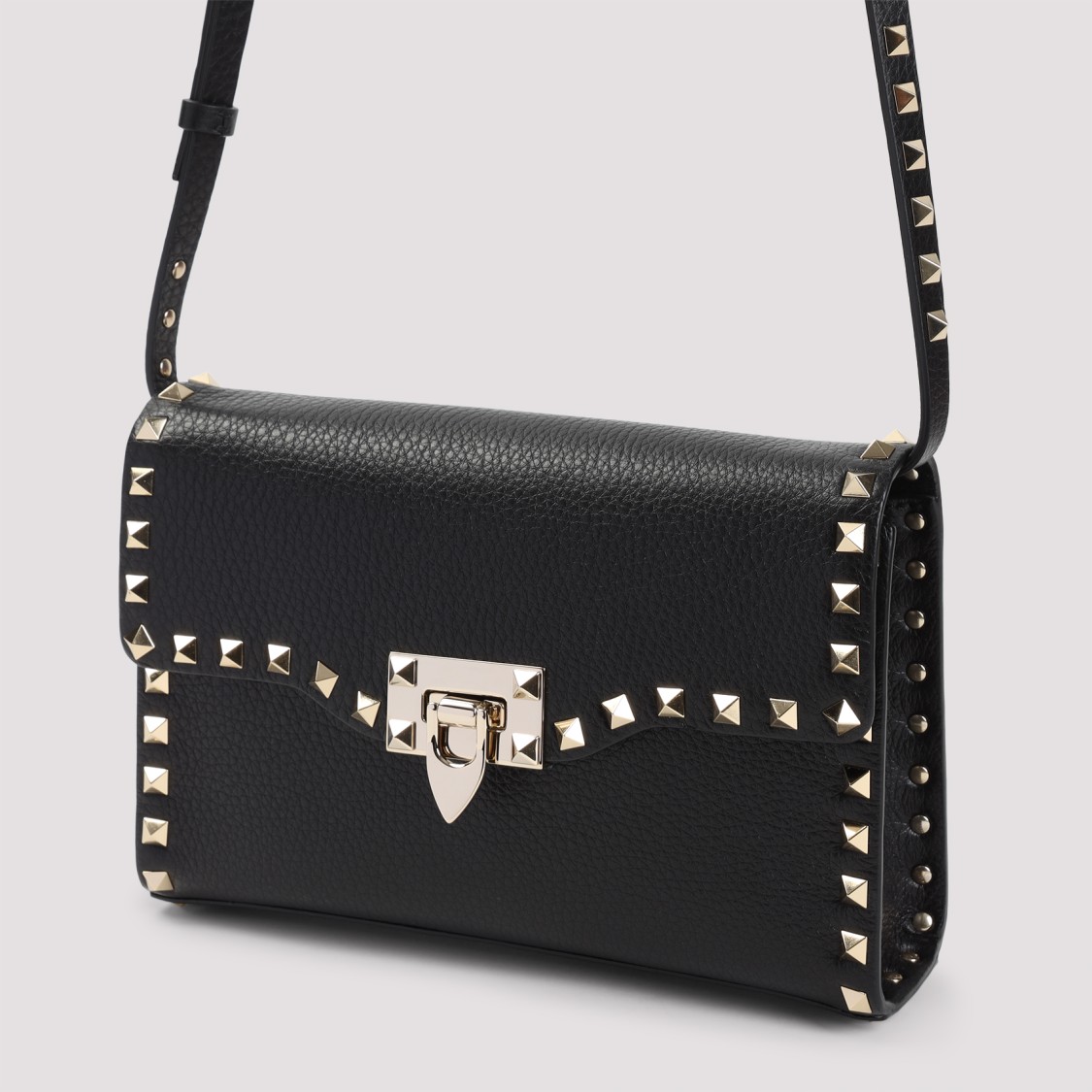 VALENTINO GARAVANI VALENTINO LEATHER SHOULDER BAG WITH METALLIC STUDS AND DISTINCTIVE CLASP