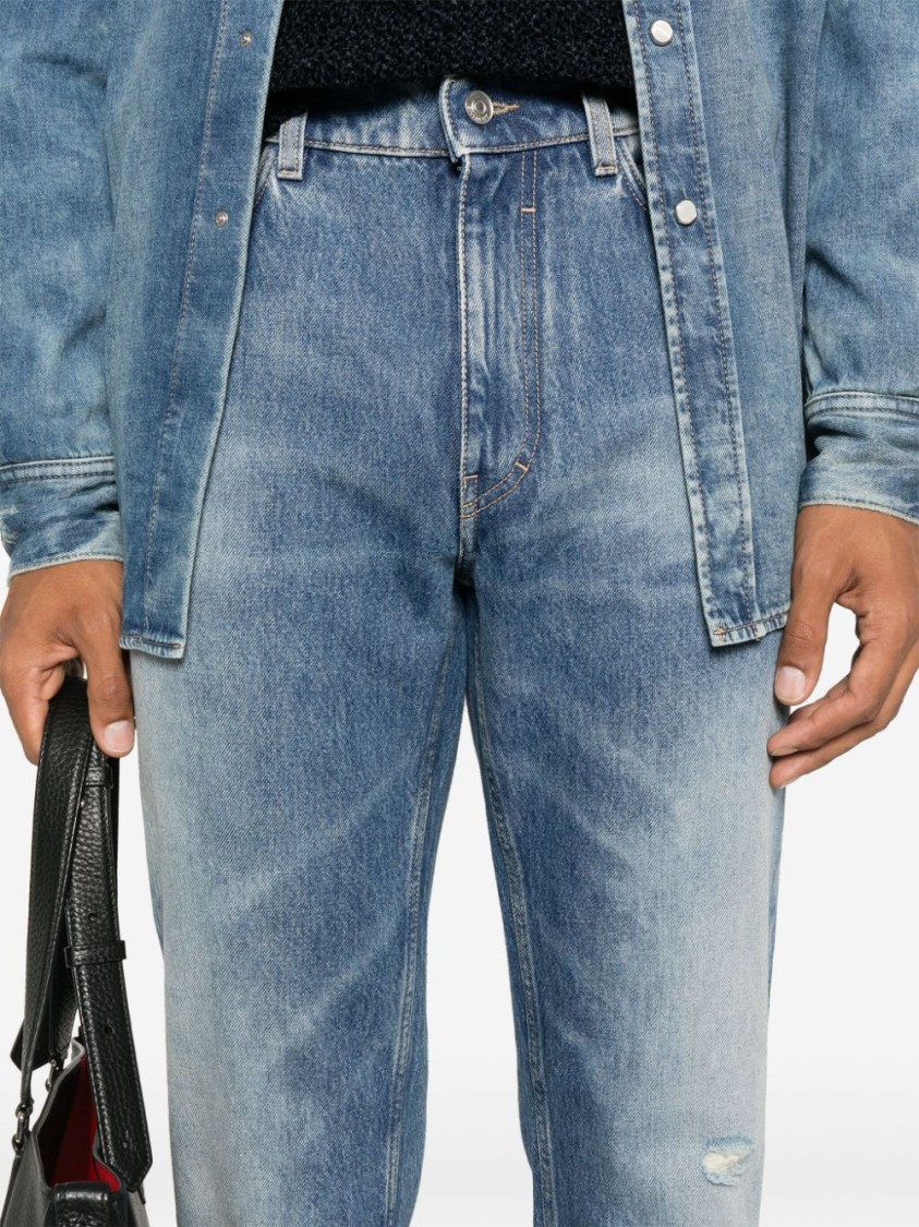 Givenchy Washed Denim Tapered Leg Jeans With Contrast Stitching In Blue