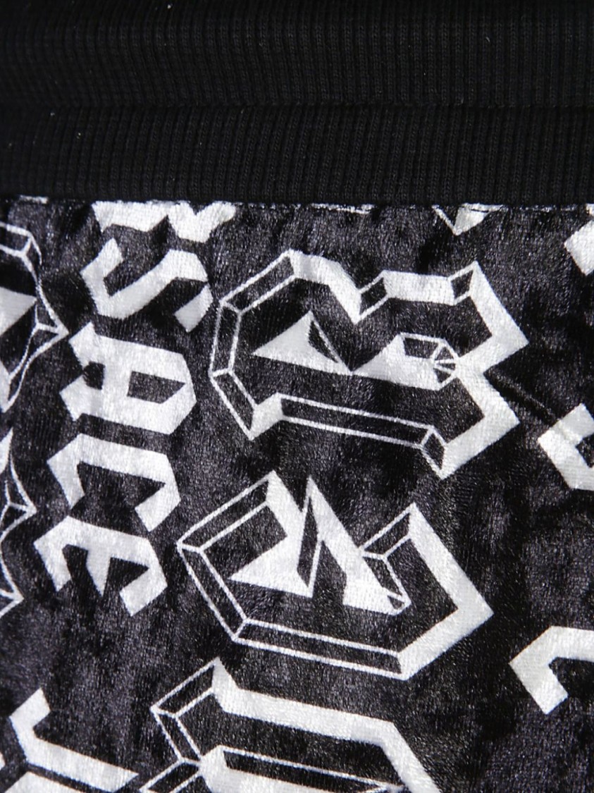Shop Versace Jeans Couture Black Trousers With Bold Graphic Print And Fit