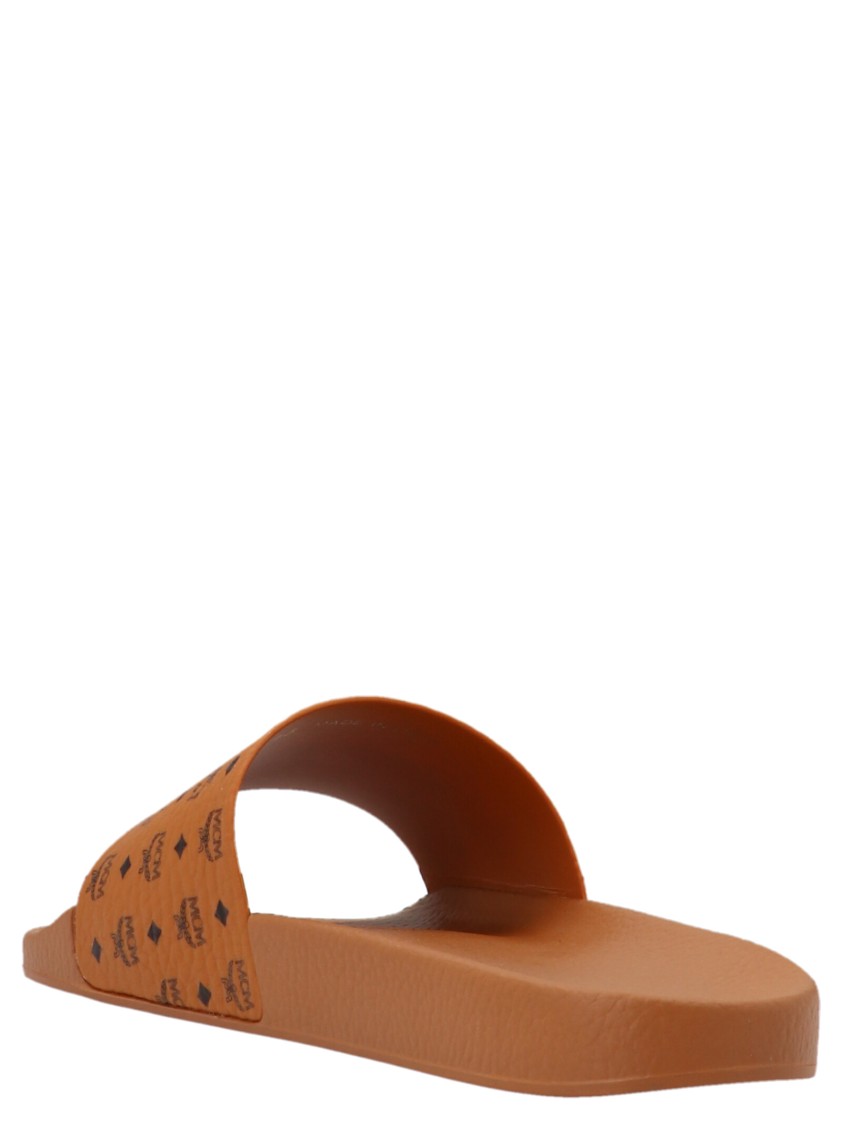Mcm All-over Monogram Slides In Brown