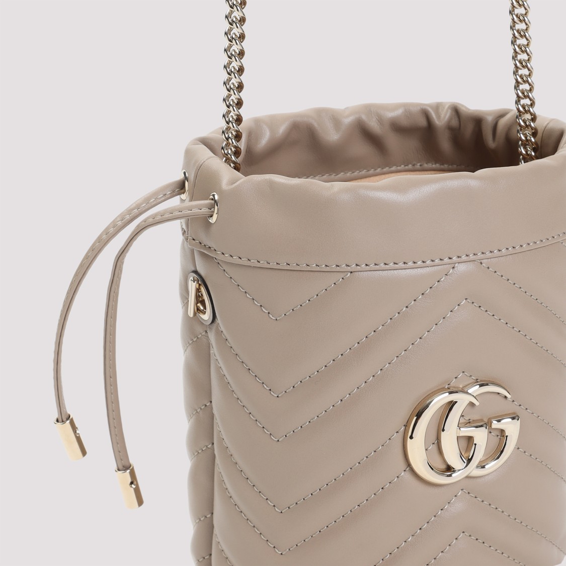 Gucci Chevron-pattern Matelassé Leather Clutch With Gold-tone Accents